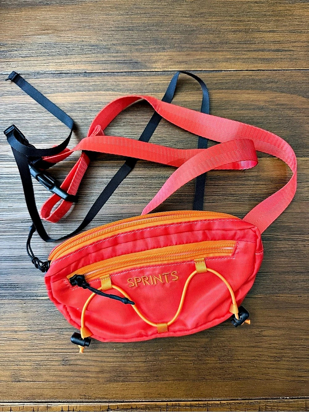 SPRINTS Fire Ruck Sling It Bag Red & Orange Crossbody